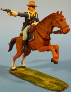 Kavallerist mit Revolver rechts schie�end zu Pferd