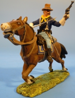 Kavallerist mit Revolver und Sbel zu Pferd