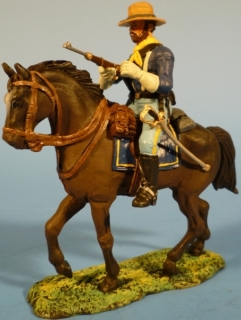 Kavallerist Gewehr quer im Arm zu Pferd