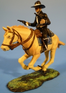 Cowboy in schwarz mit 2 Revolvern zu Pferd