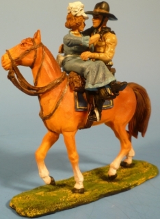 Cowboy mit Freundin im Arm