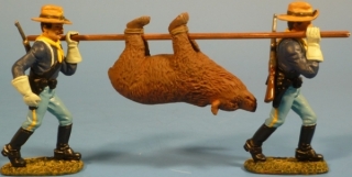 Jagdgruppe mit erlegtem Bren