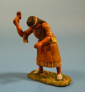 Squaw vorgebeugt stehend mit Hammer