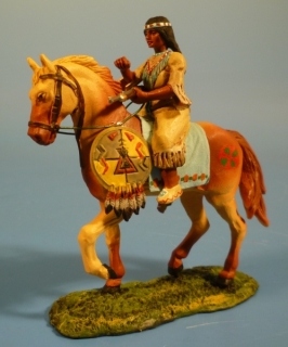 Squaw Gewehr quer haltend zu Pferd