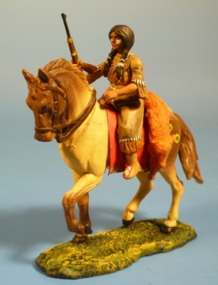 Squaw mit Gewehr auf Knie zu Pferd