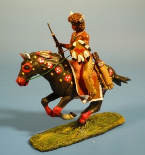 indianer mit Bffelkopf, mit Gewehr und Schild