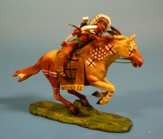 Indianer mit Pfeil und Bogen schie�end, seitlich am Pferd h�ngend