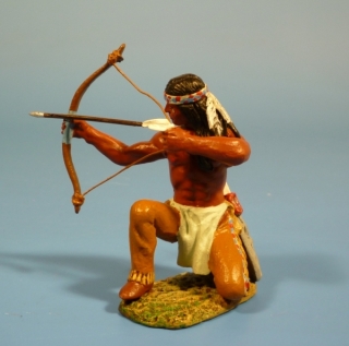 Indianer mit Pfeil und Bogen kniend nach rechts schie�end