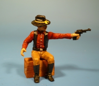 Cowboy mit Revolver schieend(fr Kutsche) 