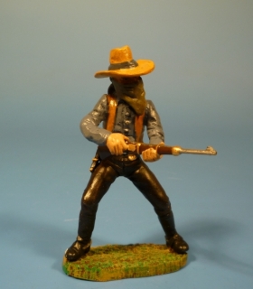 Bandit mit Gewehr aus der H�fte schie�end