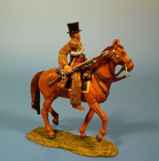 Trapper zu Pferd mit Gewehr und Zylinder