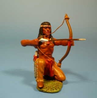 Indianer kniend mit Pfeil und Bogen nach vorne schie�end