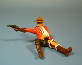 Mounty verwundet mit Revolver schieend