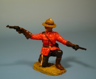 Mounty kniend mit 2 Revolvern kmpfend