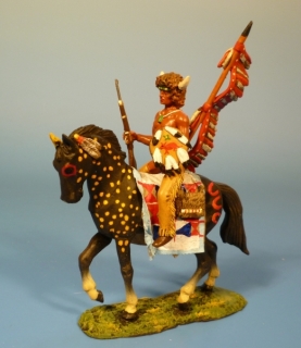 Indianer zu Pferd mit Gewehr auf Knie und Schild