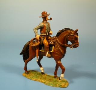 Cowboy zu Pferd mit Pfeife