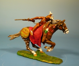 Indianer zu Pferd mit Gewehr nach rechts schie�end