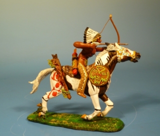 Indianer zu Pferd mit Pfeil und Bogen nach vorne schie�end
