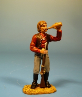 Cowboy stehend mit Flasche und Gewehr