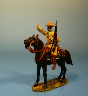 Cowboy Trapper gr��end  zu Pferd 