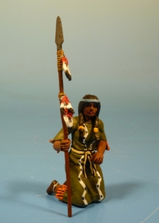 Squaw kniend mit Speer