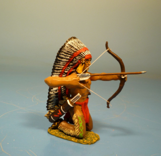 Indianer kniend mit Pfeil und Bogen schie�end