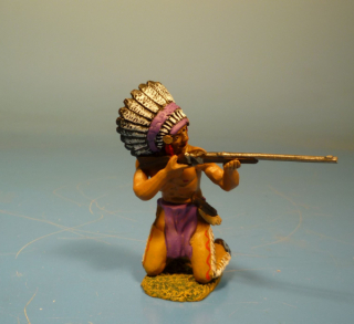 Indianer kniend mit Gewehr schie�end