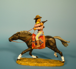 Apache zu Pferd mit Revolver schieend